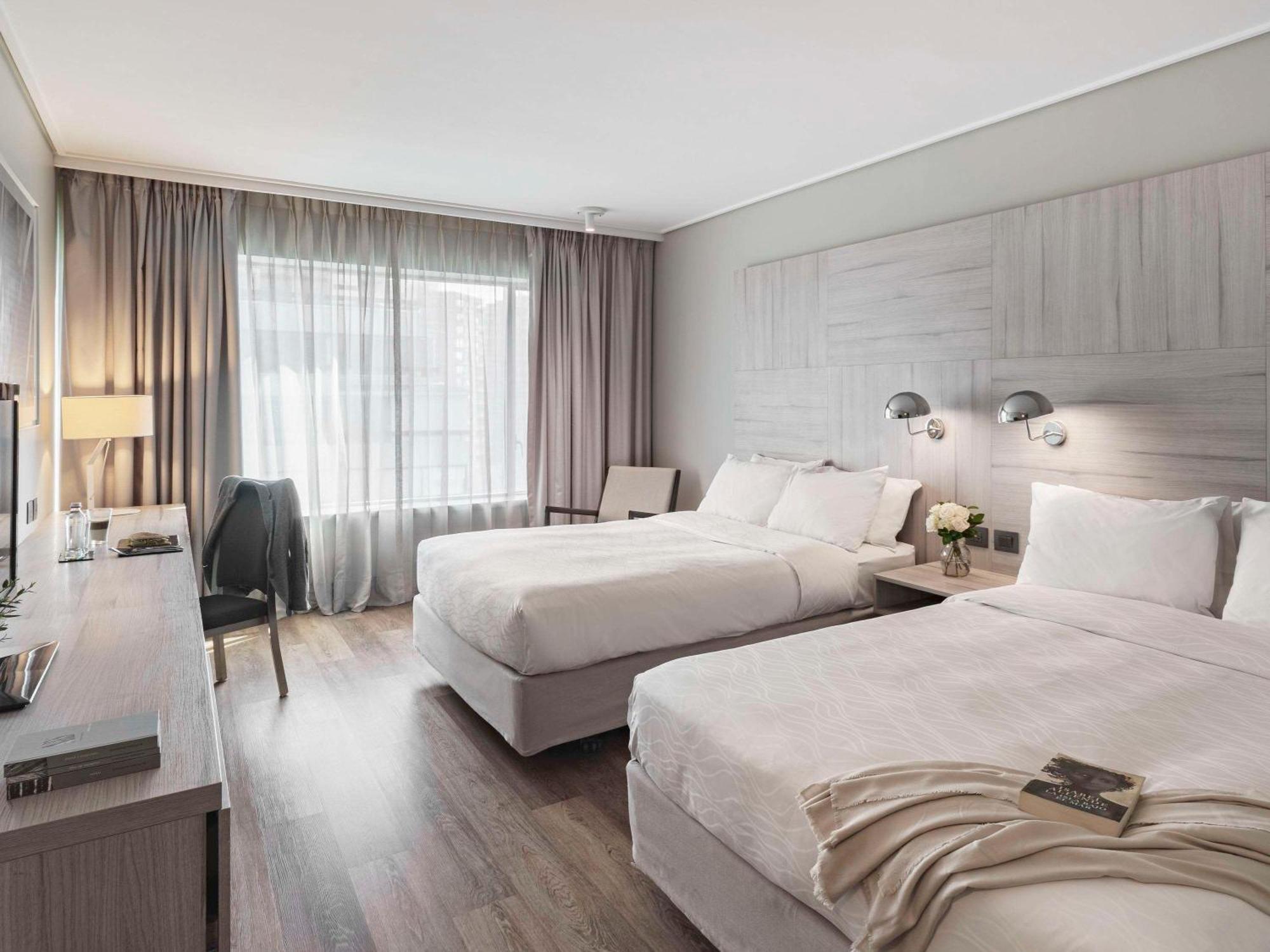 Pullman Santiago Vitacura מראה חיצוני תמונה A typical room at the hotel