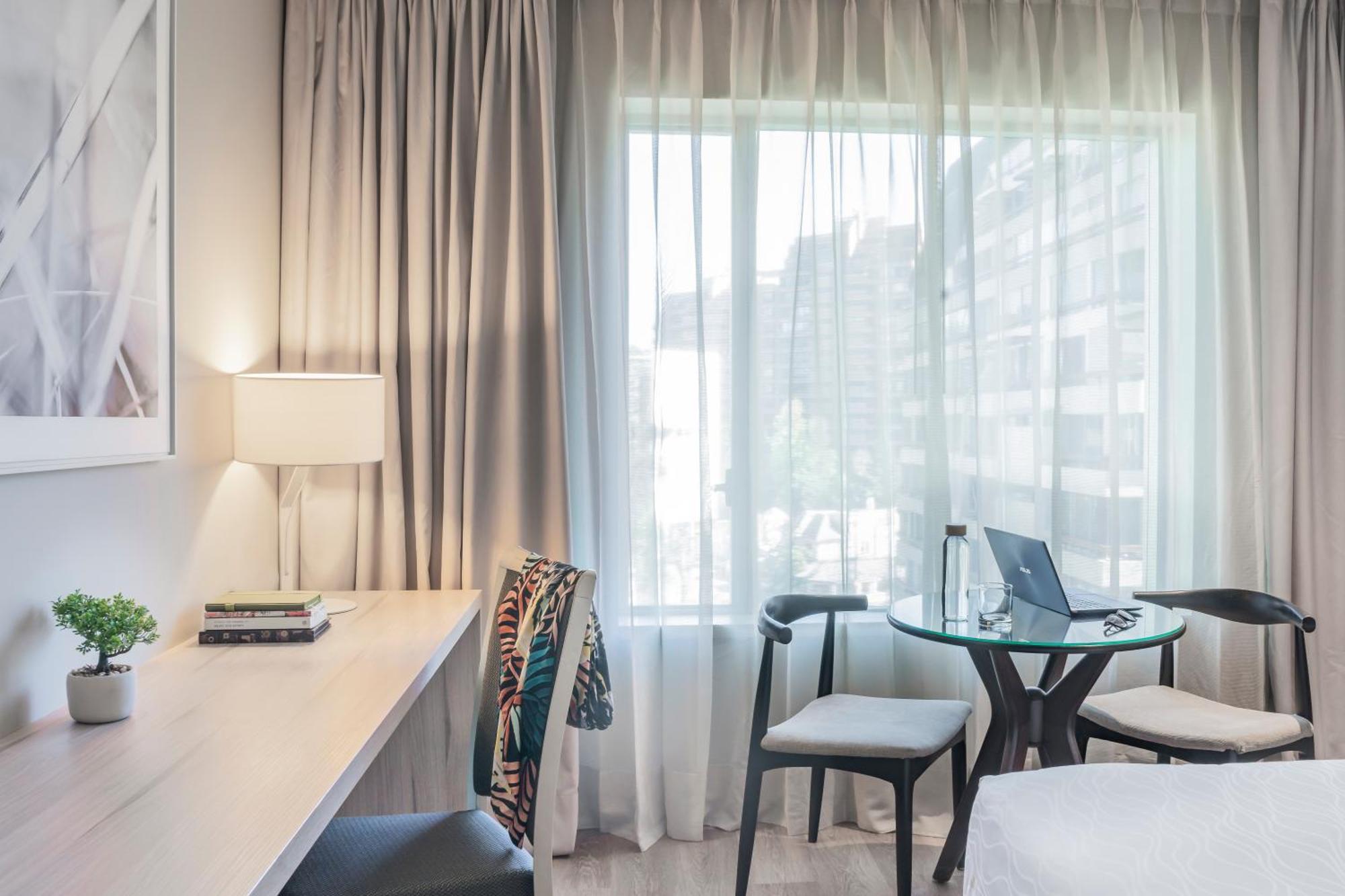 Pullman Santiago Vitacura מראה חיצוני תמונה A room at the hotel
